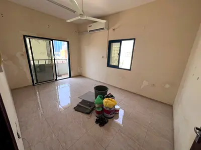 For annual rent in Ajman Corniche, second row from the Corniche, 2 balconies with sea view, at a reasonable price
