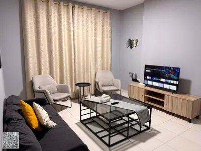 A room and living room with a practical design and a direct sea view.