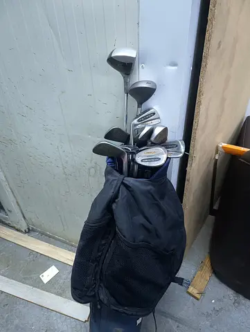 Used set of golf clubs with carry bag - mixed irons and woods