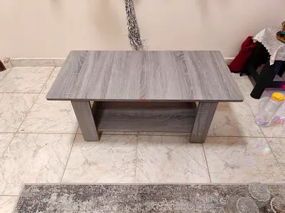 Simple grey wooden coffee table with lower shelf - good condition