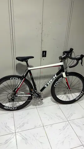 trek alloy roadbike with carbon fork and carbon wheelset roval rapid racing wheels
