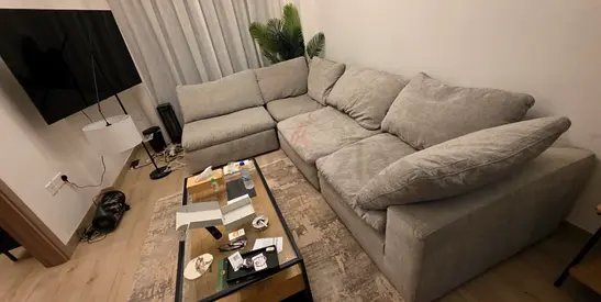 Same Like a brand new pan Emirates Pianca corner feather filled sofa