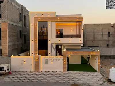 For sale, including registration fees: a luxurious villa with super deluxe finishes, 4 master bedrooms, in the Al Zahia area.
