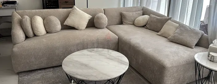 Light grey L-shaped sectional sofa with cushions - Custom Made