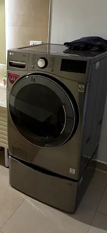 LG ThinQ Front Load Dryer, 18kg and Sidekick Barely used.