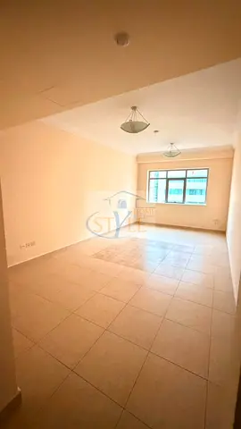 For sale | One-bedroom apartment with a living room in Style Tower – Sharjah. A great opportunity to own or invest with a current tenant paying 37, an