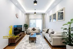 Luxury apartment, second tenant. One bedroom, living room, and open balcony. Ajman Corniche. Fully f