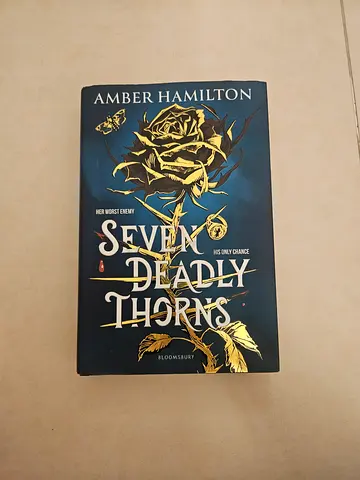 Seven deadly thorns- Amber Hamilton fantasy book