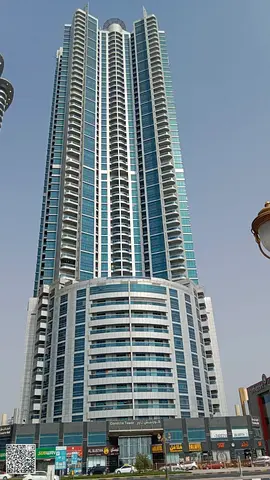 Balcony with open view - gym, swimming pool, sauna, and jacuzzi. Room and lounge in Corniche Tower, Ajman