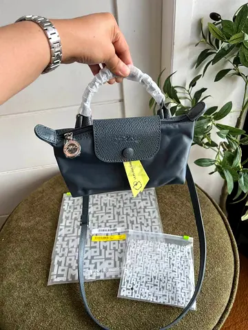 Small navy Longchamp Le Pliage shoulder bag with crossbody strap