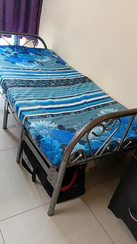 Single metal bed frame with mattress -