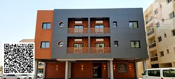 A residential and commercial building for sale directly from the owner, featuring a prime location a