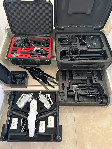 DJI Inspire 1 Pro with 3 batteries, 2 controllers, charging cables and props.