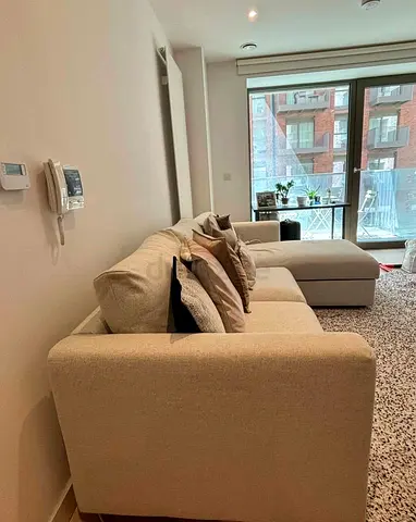 Light beige fabric L-shaped sectional sofa bed with chaise