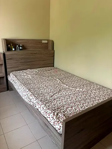 Single wooden bed frame with headboard and side shelf - good condition