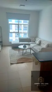 Furnished 1BR Hall in City Tower, Ajman. Partial Sharjah view, parking inside tower. Annual rent AED