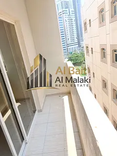 1-Bedroom Apartment for Annual Rent in Al Majaz 3, Sharjah, featuring 1 Bathroom, Central AC and a C