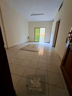 For rent in Sharjah Al Qasimia Al Nad 1 bedroom living room central AC balcony wall closet free mont