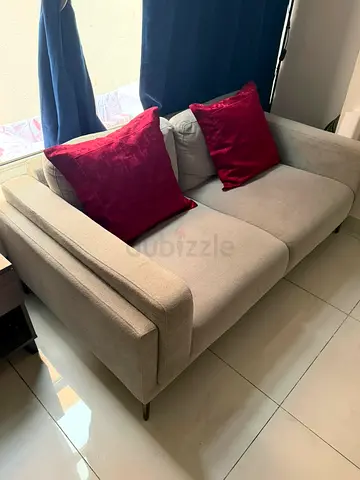 Light grey 2-seater sofa in good condition