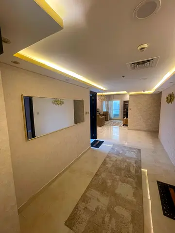 Fully furnished 2-bedroom apartment with a living room, featuring parking, a gym, and a swimming pool; offers an unobstructed view and is situated in