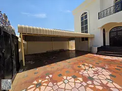 Villa for annual rent in Al Rawda, Ajman, with a built-up area of 5,000 sq. ft., consisting of 5 bed