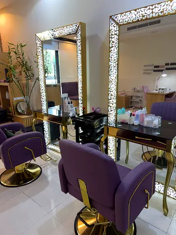 Salon styling station with illuminated mirror and purple chairs (set of 2)