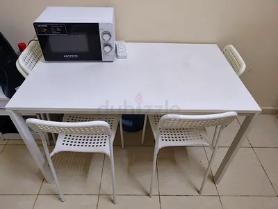 White dining table with 6 chairs - simple modern set
