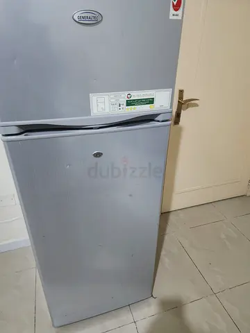 Single-door upright refrigerator/freezer - good working condition
