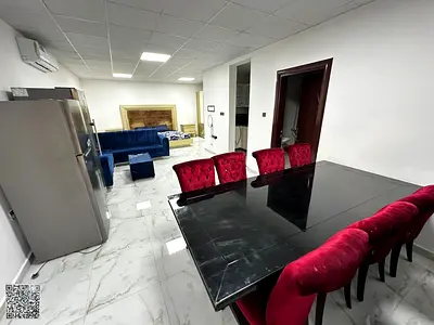 Villa for investment in Al Rawda, currently rented on a monthly basis for AED 48,000. It consists of 15 units and 15 parking spaces.