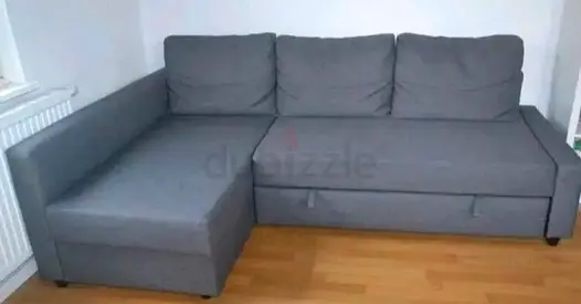 Grey L-shaped Sofa Bed with Storage — Good Condition