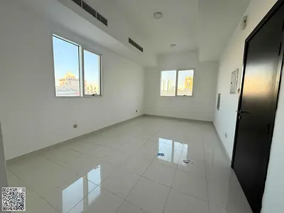 **"One-bedroom apartment with a living room, second tenant, available for annual rent near Ajman Corniche.