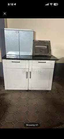 IKEA kitchen with black marble top