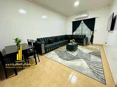 Luxury one-bedroom apartment with a living room and balcony offering an open view. Ajman, Al Muwaih