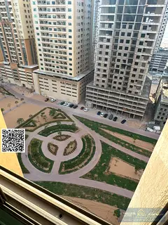 Spacious 2 Bedroom Apartment with Parking for Sale in Paradise Lake Towers B5 | Emirates City, Ajman