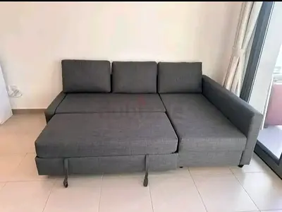 Gray L-shaped Sofa Bed with Storage - Good Condition