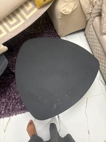Black triangular side/coffee table - compact modern design