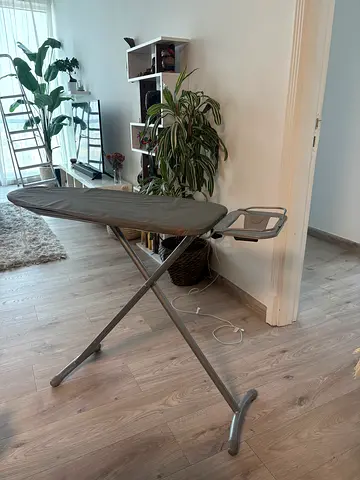 Foldable ironing board with cover and iron rest - perfect condition