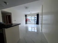 1 bedroom without balcony with big window in hall and master room cover parking road view