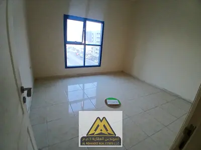 2BR in Al Khor Towers, closed kitchen, 3 baths, maid room, balcony, open view, AED 35K, 4 payments.
