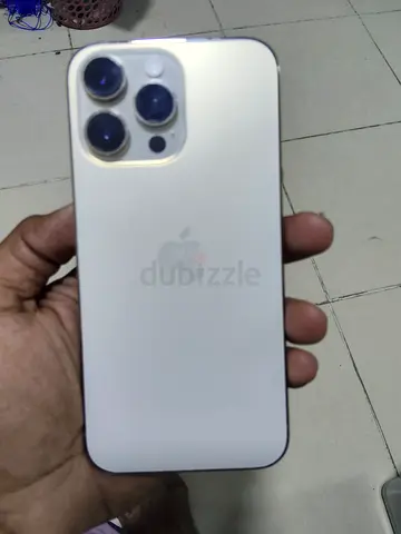 iPhone 13/14 Pro-style silver (used) - back view, good condition