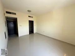 A spacious studio apartment with a separate kitchen and central air conditioning, in a prime locatio