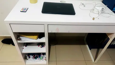 White wooden study desk with drawers and shelving