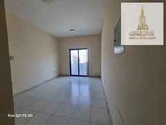 Apartment with one bedroom and a living room available for annual rent; offers easy access to Sharja