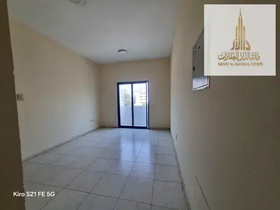 Apartment with one bedroom and a living room available for annual rent; offers easy access to Sharjah and Dubai.
