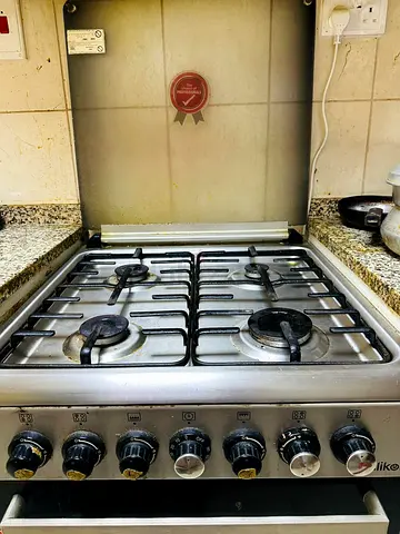 4 burner Stainless Steel Gas Cooker with Oven - Used, Working