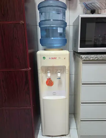 Used Sure Water Dispenser with 5-Gallon Bottle - Working Condition