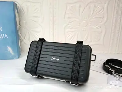 Black Dior X Rimowa aluminium personal clutch
