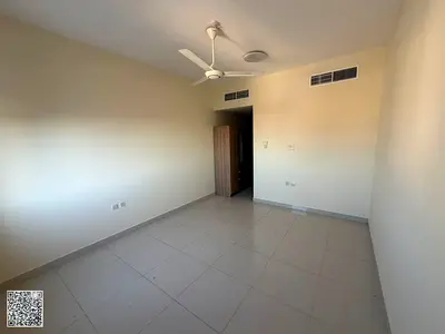 Studio for annual rent in Al Mowaihat with a separate kitchen.