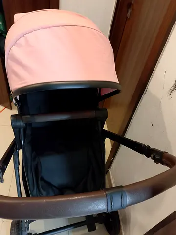 Pink and Black Baby Stroller with Leather Handle
