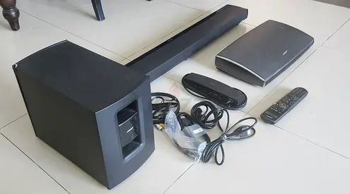 Bose Soundbar with Subwoofer and Remotes - Good Working Condition.